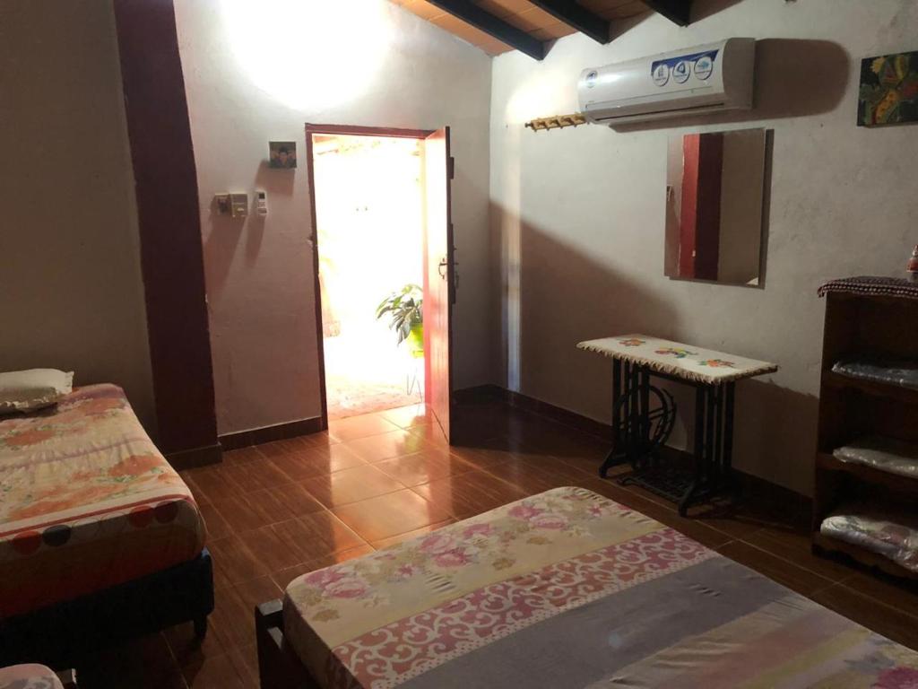 Postel nebo postele na pokoji v ubytování Rancho Ña Ignacia Nueva Colombia