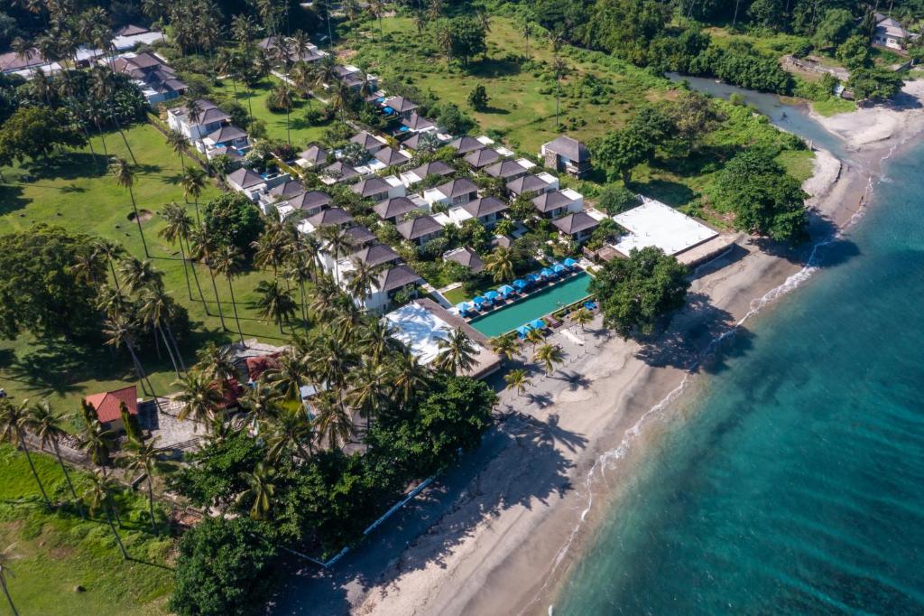 an aerial view of a resort on the beach at Living Asia Resort and Spa in Senggigi