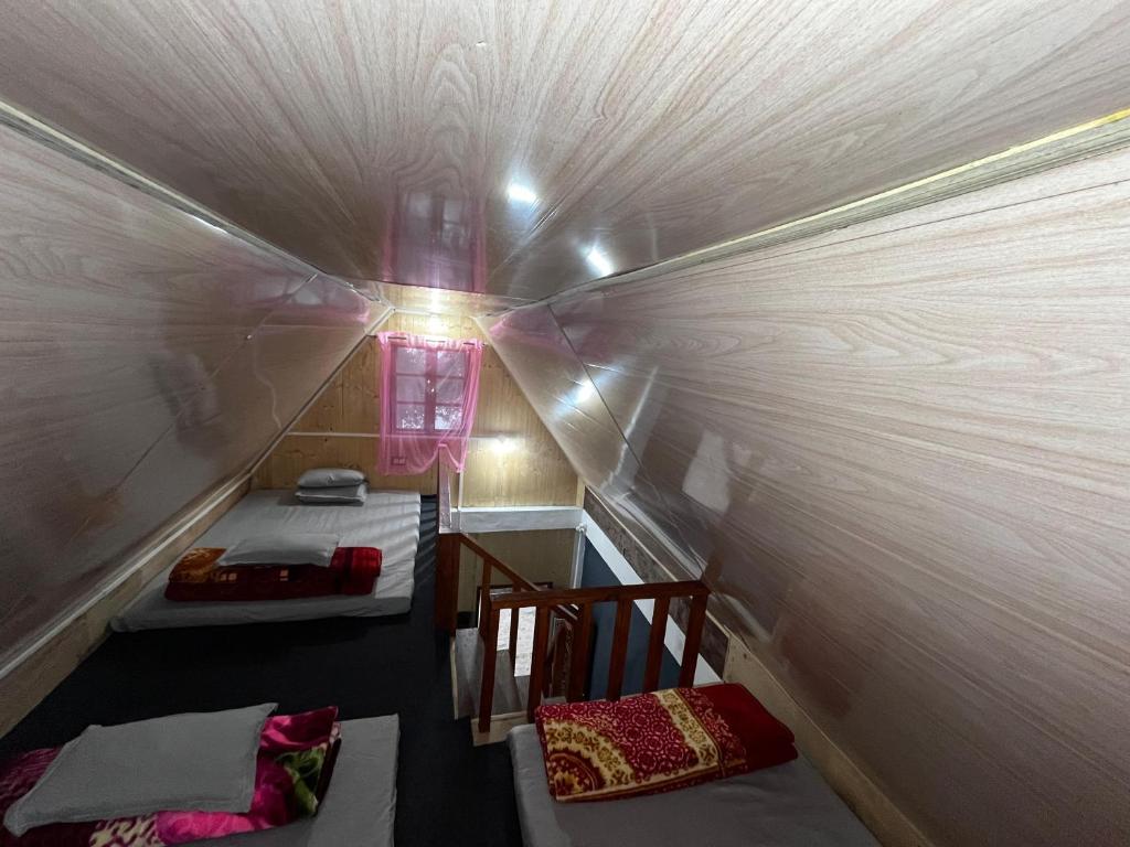 Postel nebo postele na pokoji v ubytování Bae Lae View Homestay