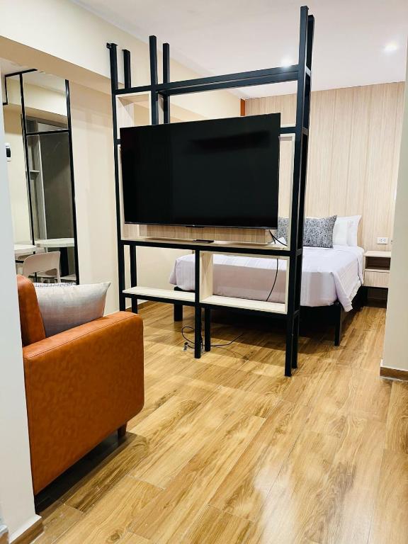 TV a/nebo společenská místnost v ubytování LOS ARCES HOTEL