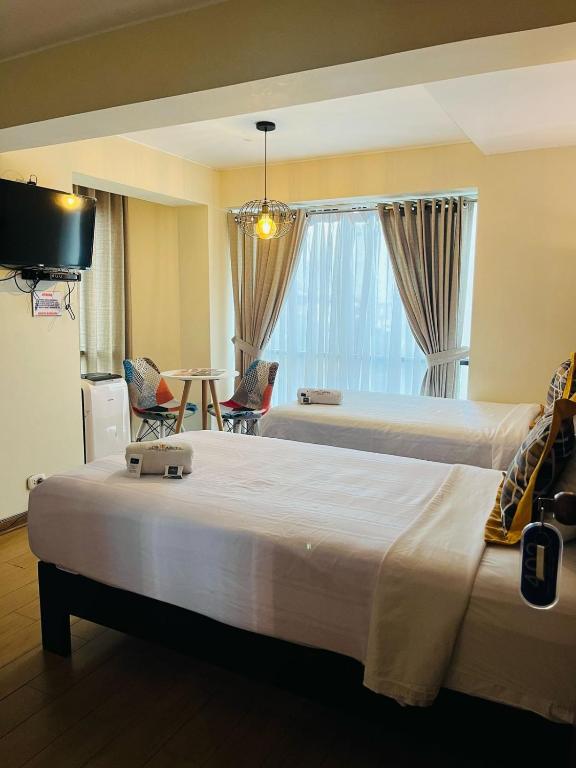 TV a/nebo společenská místnost v ubytování LOS ARCES HOTEL