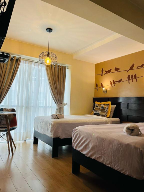 Postel nebo postele na pokoji v ubytování LOS ARCES HOTEL