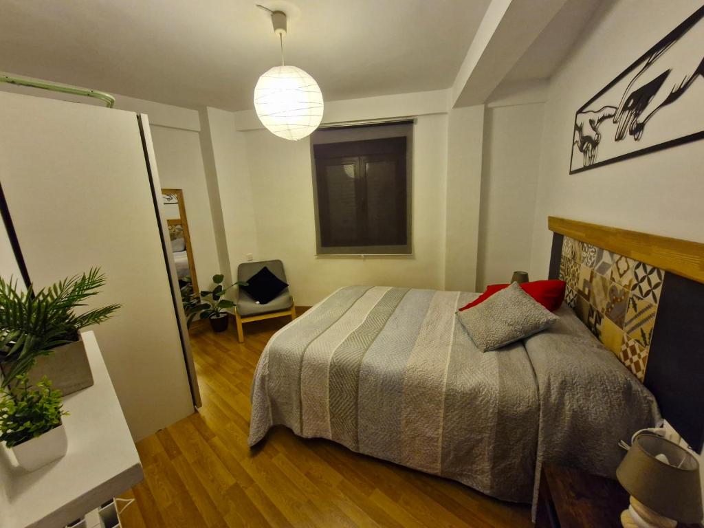 Postel nebo postele na pokoji v ubytování Apartamento Centro de Toledo
