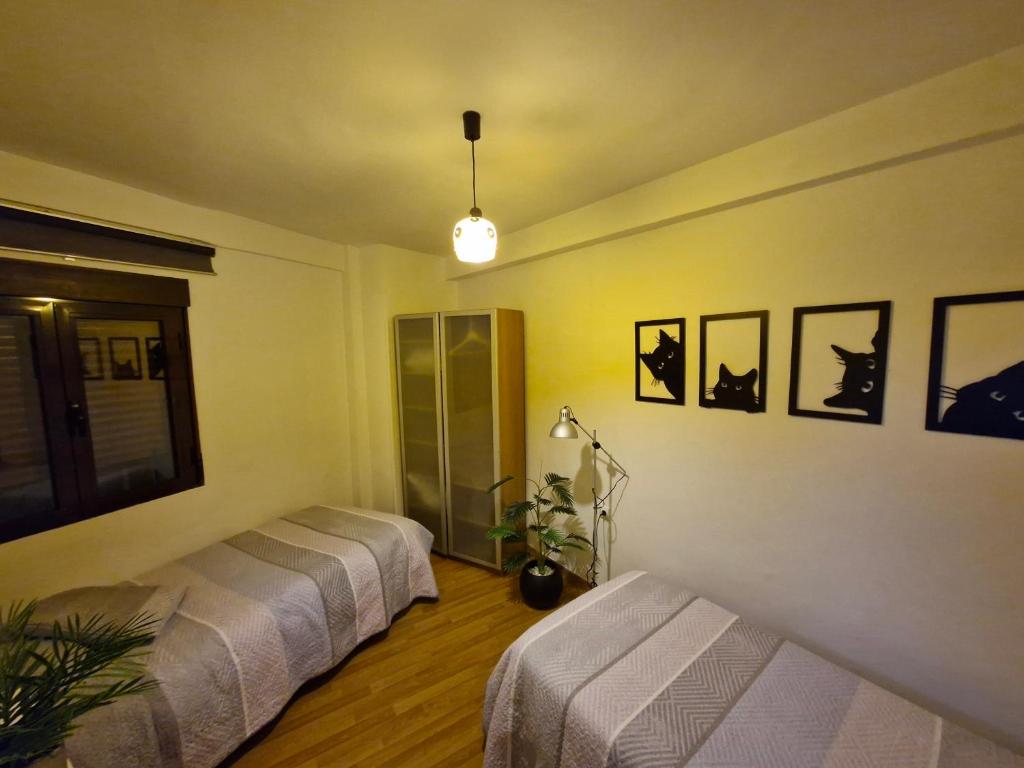Postel nebo postele na pokoji v ubytování Apartamento Centro de Toledo