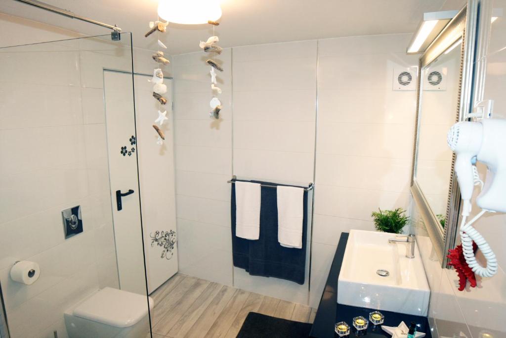 Koupelna v ubytování Apartments Stefani