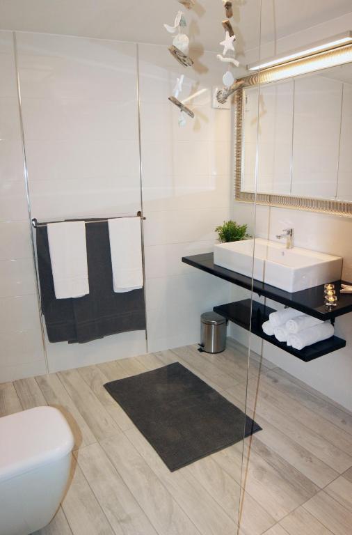 Koupelna v ubytování Apartments Stefani