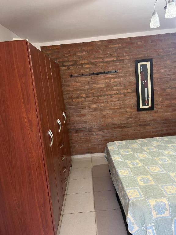 Ένα ή περισσότερα κρεβάτια σε δωμάτιο στο Apartment Rivadavia