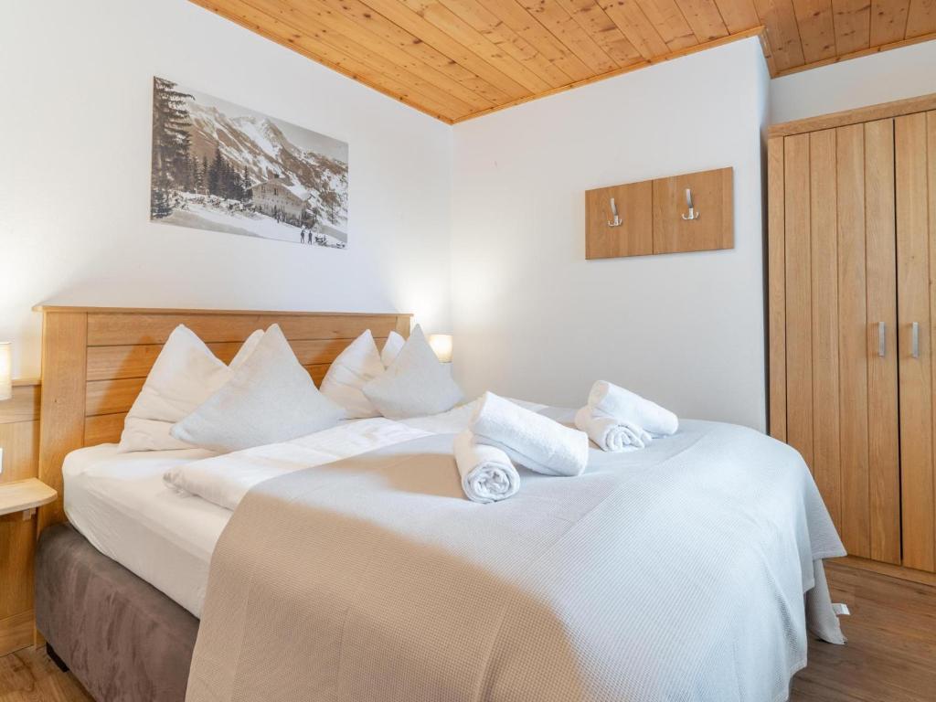 Posteľ alebo postele v izbe v ubytovaní Alpensteinbock Saalbach L