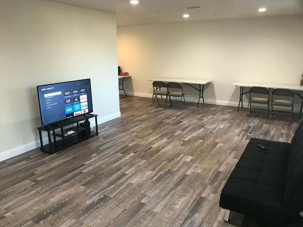 A television and/or entertainment centre at VWM Hostel