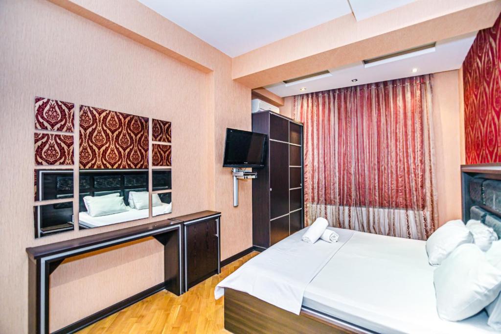 Ένα ή περισσότερα κρεβάτια σε δωμάτιο στο Delux apartment near winter park