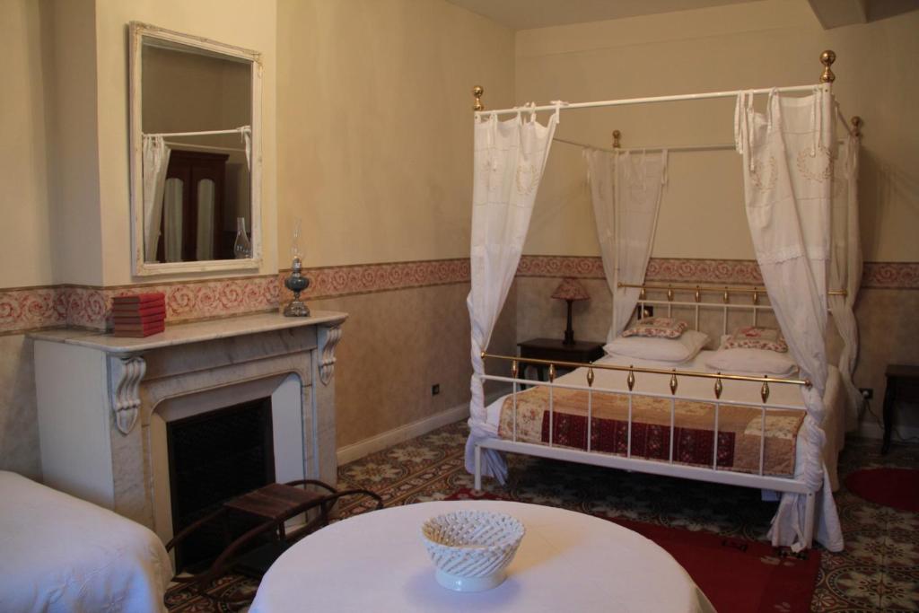 Letto o letti in una camera di Anges Gardiens