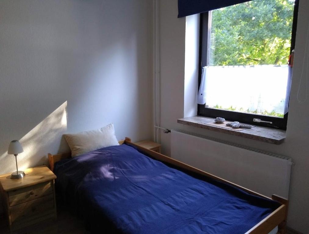 Postel nebo postele na pokoji v ubytování Rieger FW 1