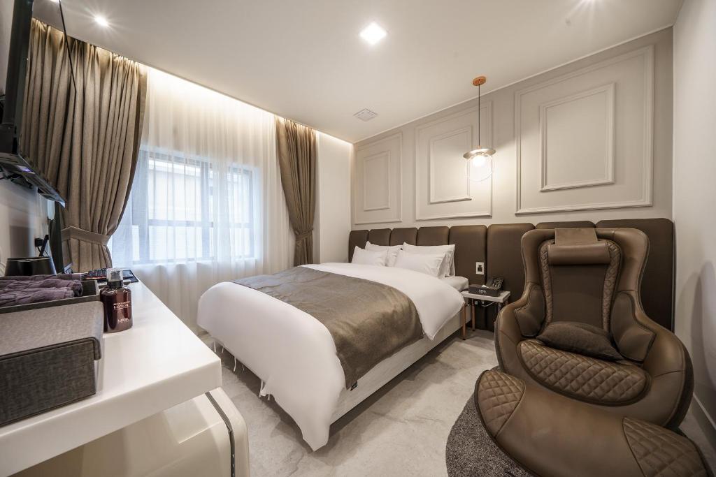 Postel nebo postele na pokoji v ubytování Hotel MARIA