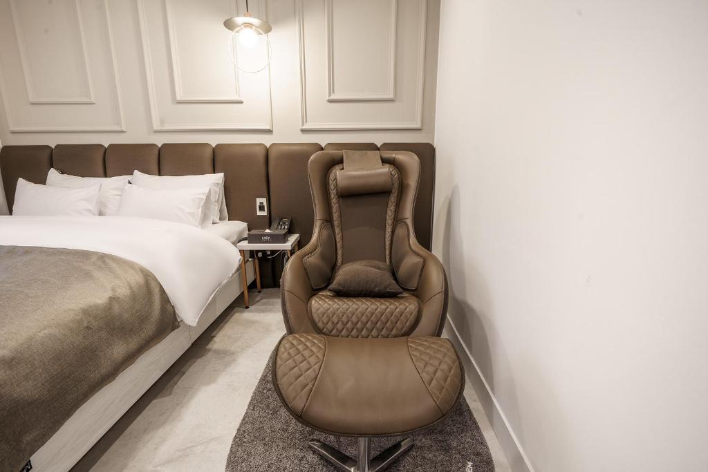 Postel nebo postele na pokoji v ubytování Hotel MARIA