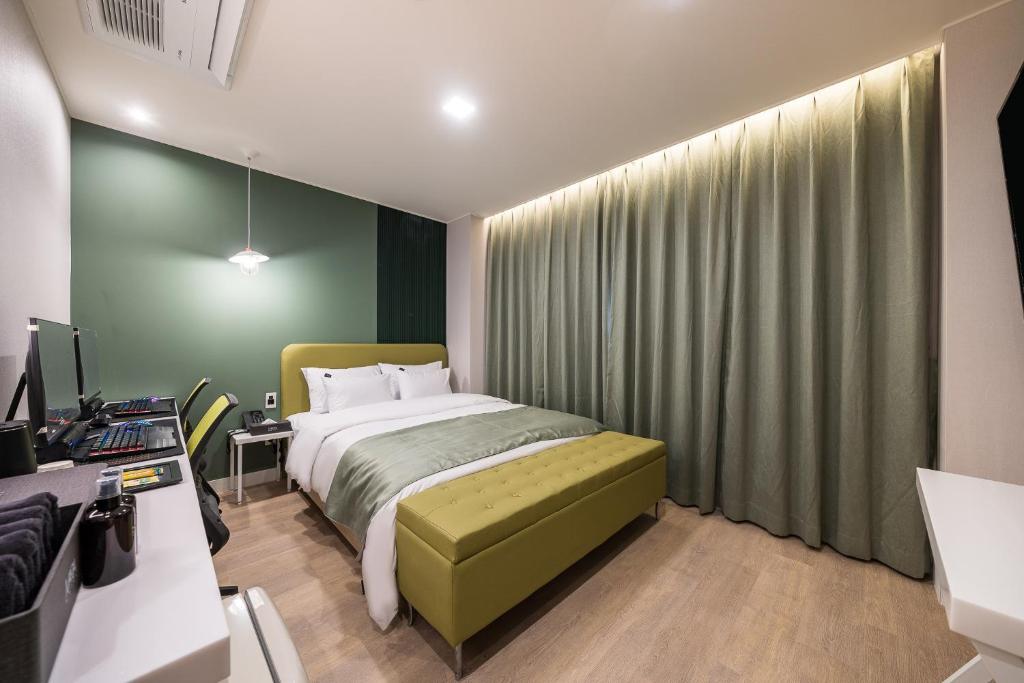 Postel nebo postele na pokoji v ubytování Hotel MARIA