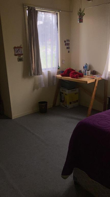 Postel nebo postele na pokoji v ubytování hospedaje Dalcahue
