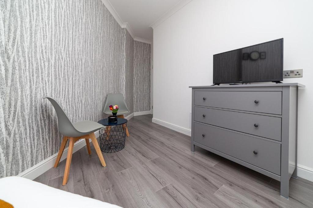 TV a/nebo společenská místnost v ubytování Diana Hotel