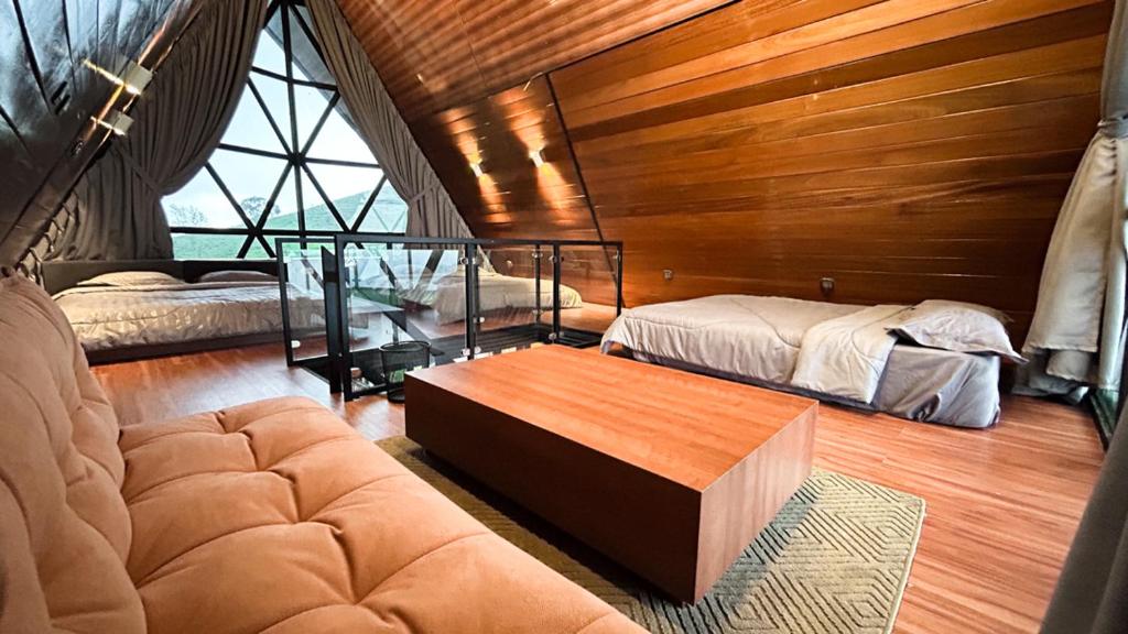 Postel nebo postele na pokoji v ubytování Nimo Tea Resort