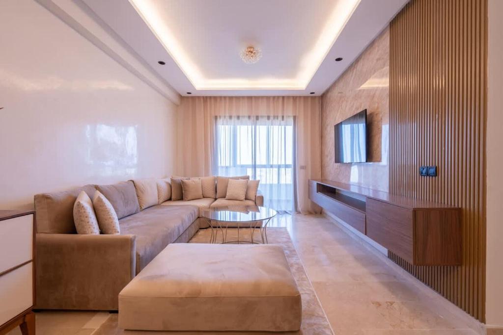 TV a/nebo společenská místnost v ubytování Appartement Prestige et Confort