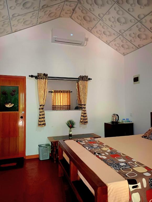 Postel nebo postele na pokoji v ubytování Turtle Island Cabana