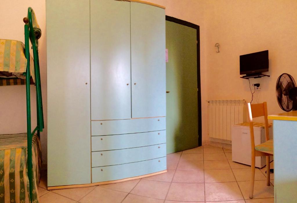 TV a/nebo společenská místnost v ubytování Lungomare Hotel