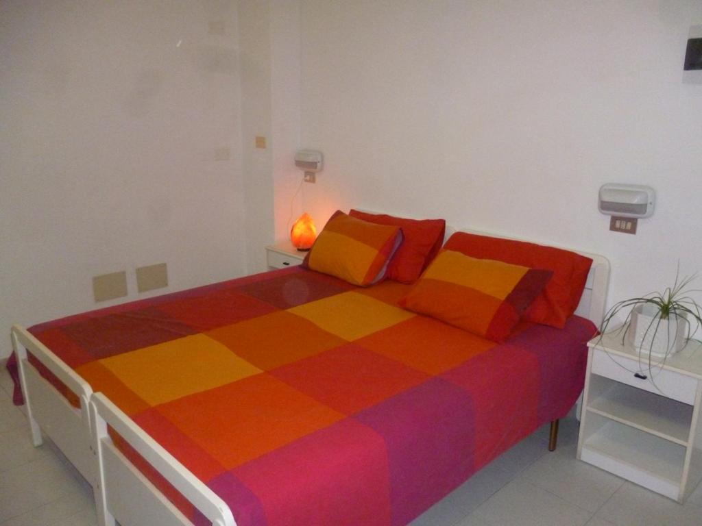 Postel nebo postele na pokoji v ubytování Residence BluAdria