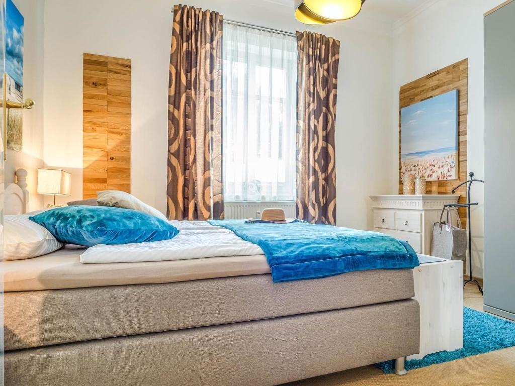 Postel nebo postele na pokoji v ubytování Villa Balticum - Ferienwohnung 2