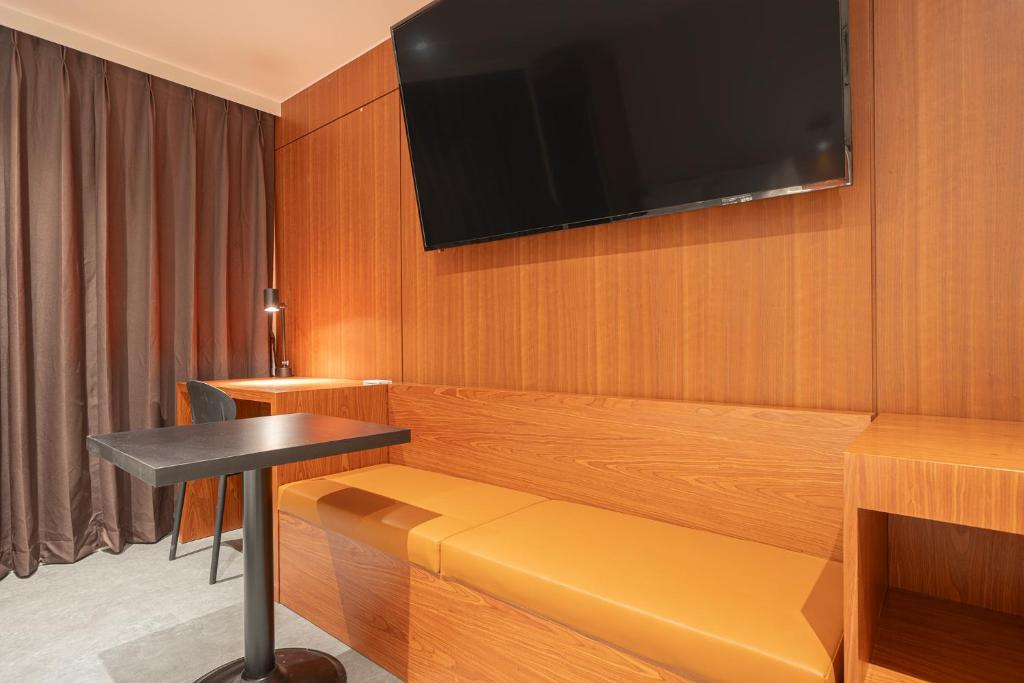 TV a/nebo společenská místnost v ubytování Monolith Hotel Cheonan