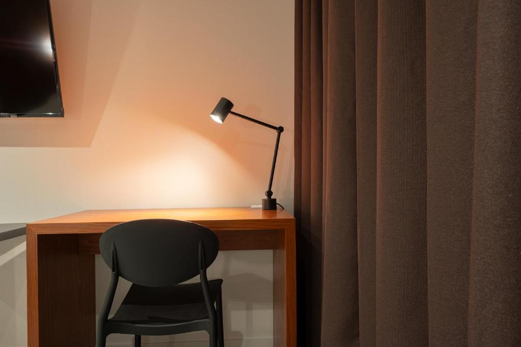 TV a/nebo společenská místnost v ubytování Monolith Hotel Cheonan