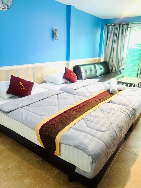 Postel nebo postele na pokoji v ubytování Searide hotel