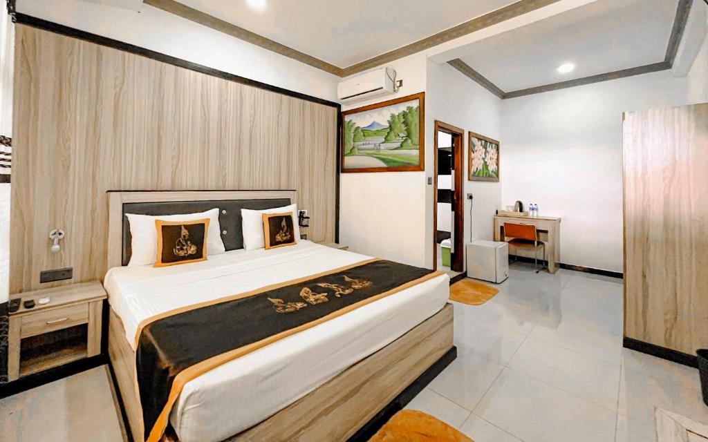 Postel nebo postele na pokoji v ubytování Sigiriya Kingdom Resort