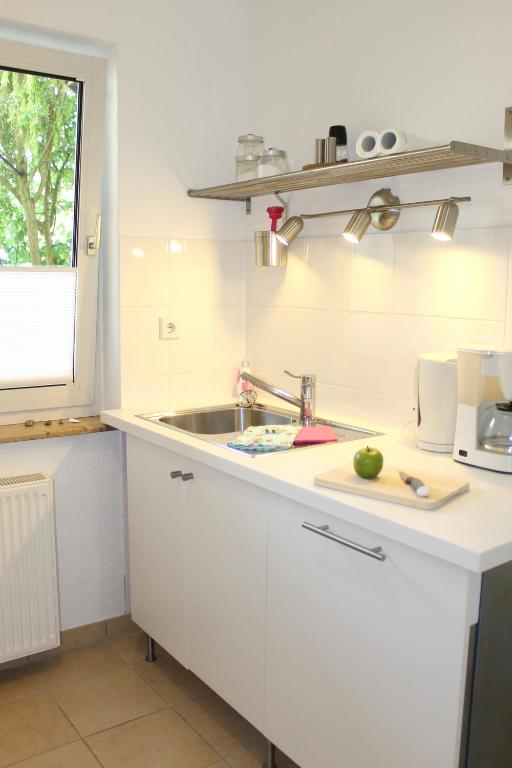 Kuchyň nebo kuchyňský kout v ubytování "Garten"