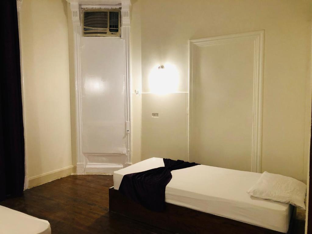 Postel nebo postele na pokoji v ubytování Mesho Cairo Hostel
