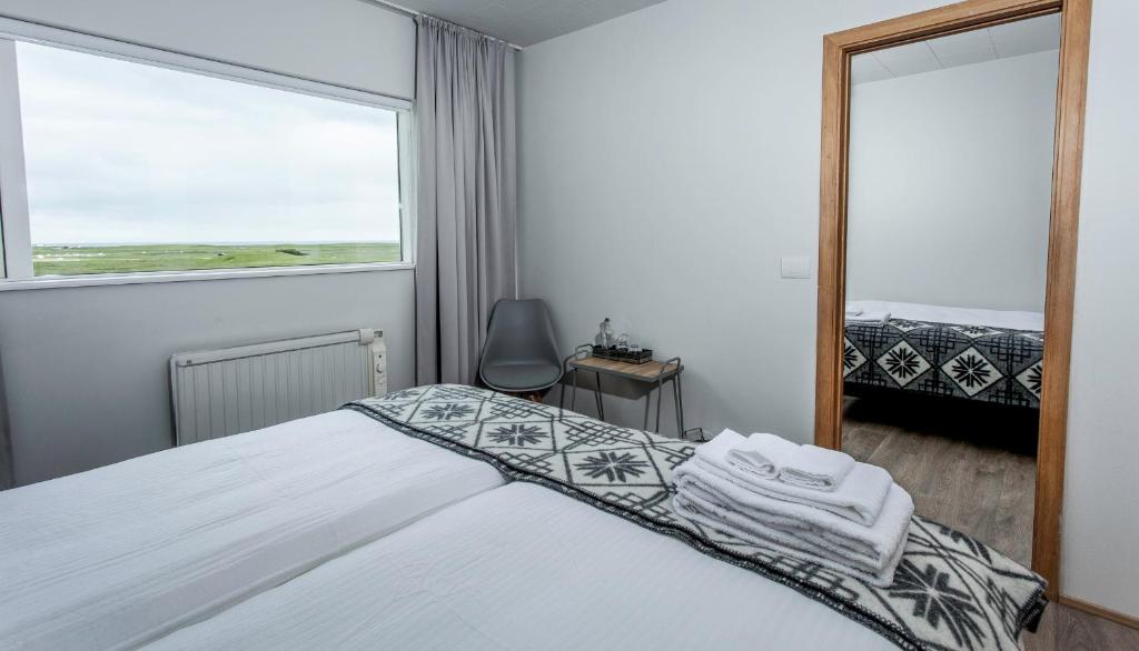 Postel nebo postele na pokoji v ubytování Farmhouse Lodge