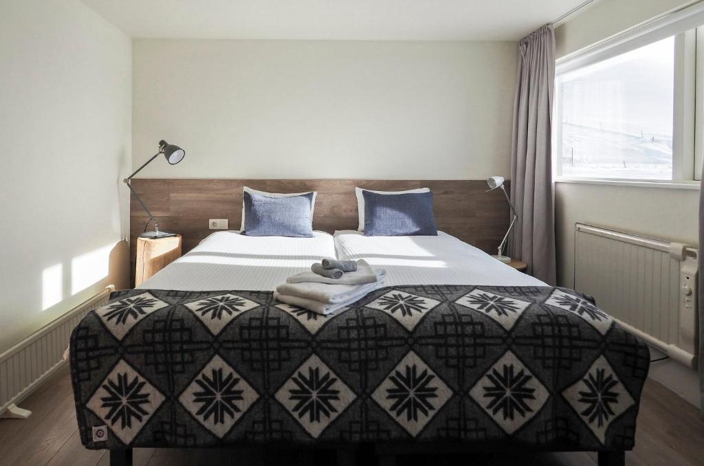 Postel nebo postele na pokoji v ubytování Farmhouse Lodge