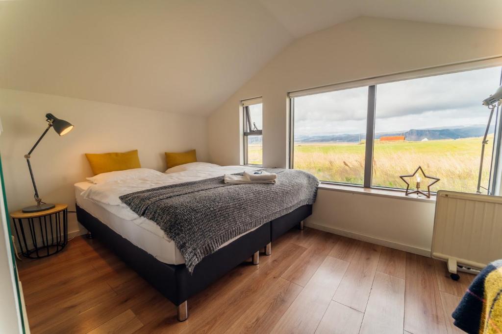 Postel nebo postele na pokoji v ubytování Farmhouse Lodge