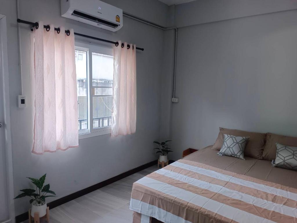 Cama o camas de una habitación en The Little home