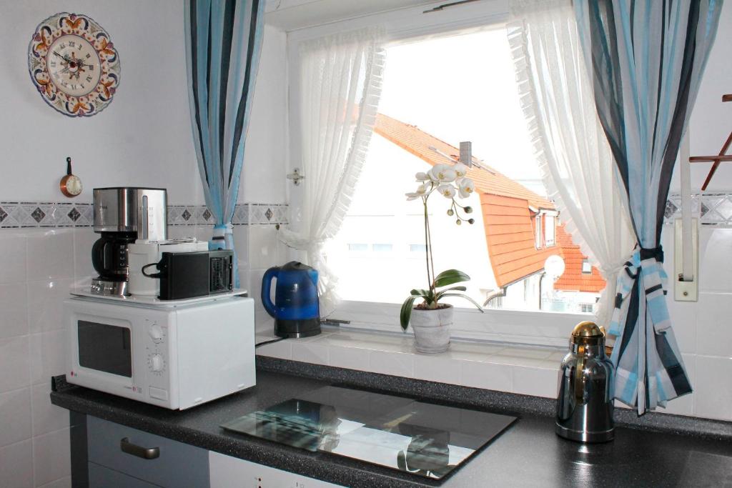 Kuchyň nebo kuchyňský kout v ubytování Haus Strandfee - App 12