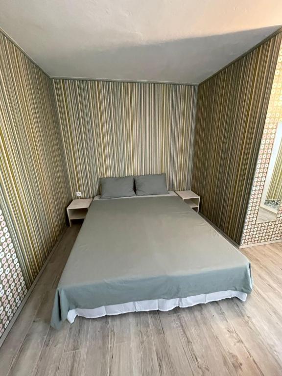 Postel nebo postele na pokoji v ubytování Liya
