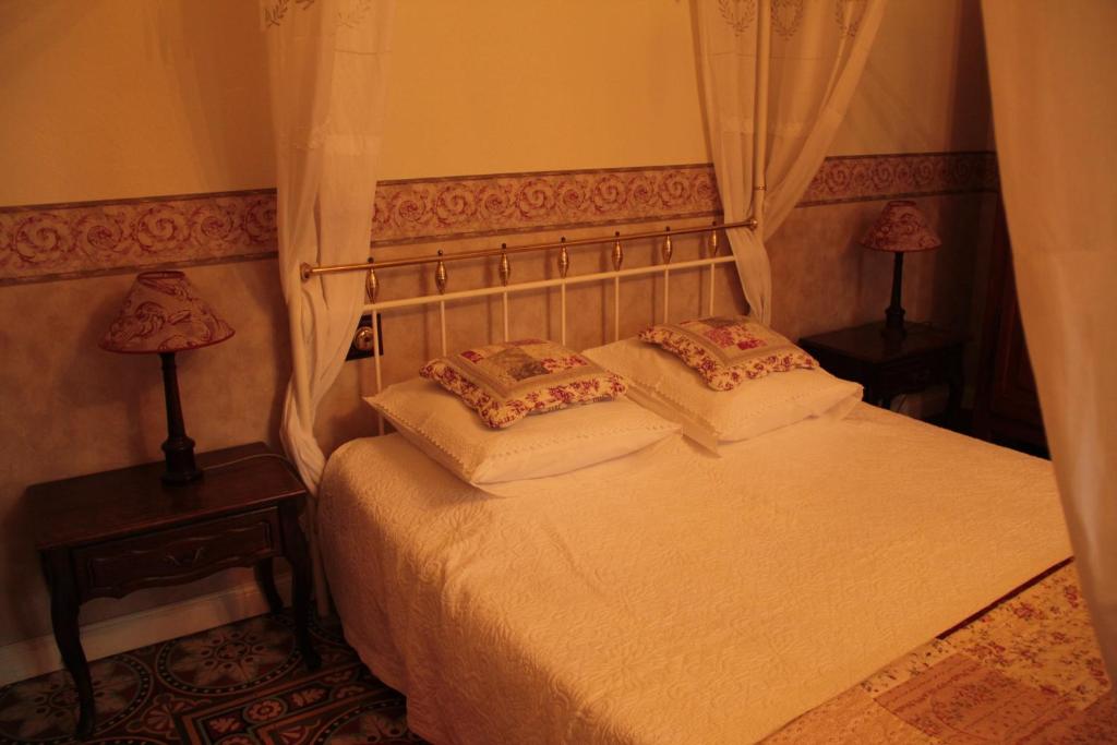 Letto o letti in una camera di Anges Gardiens