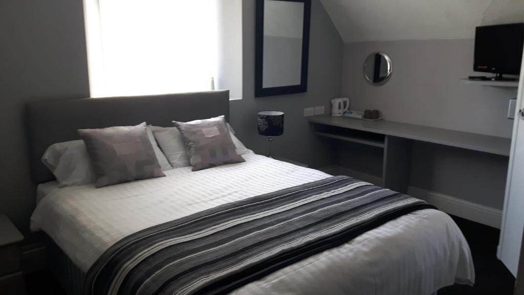 Letto o letti in una camera di Surfside Stop