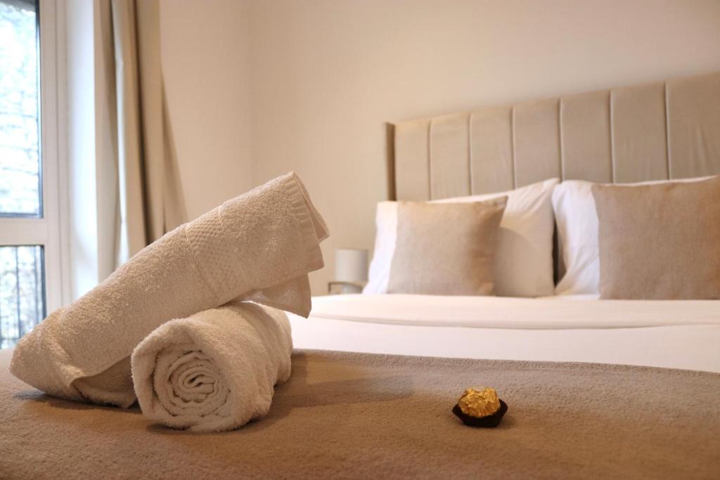 Ένα ή περισσότερα κρεβάτια σε δωμάτιο στο Luxury Flat close to City Centre & Docks