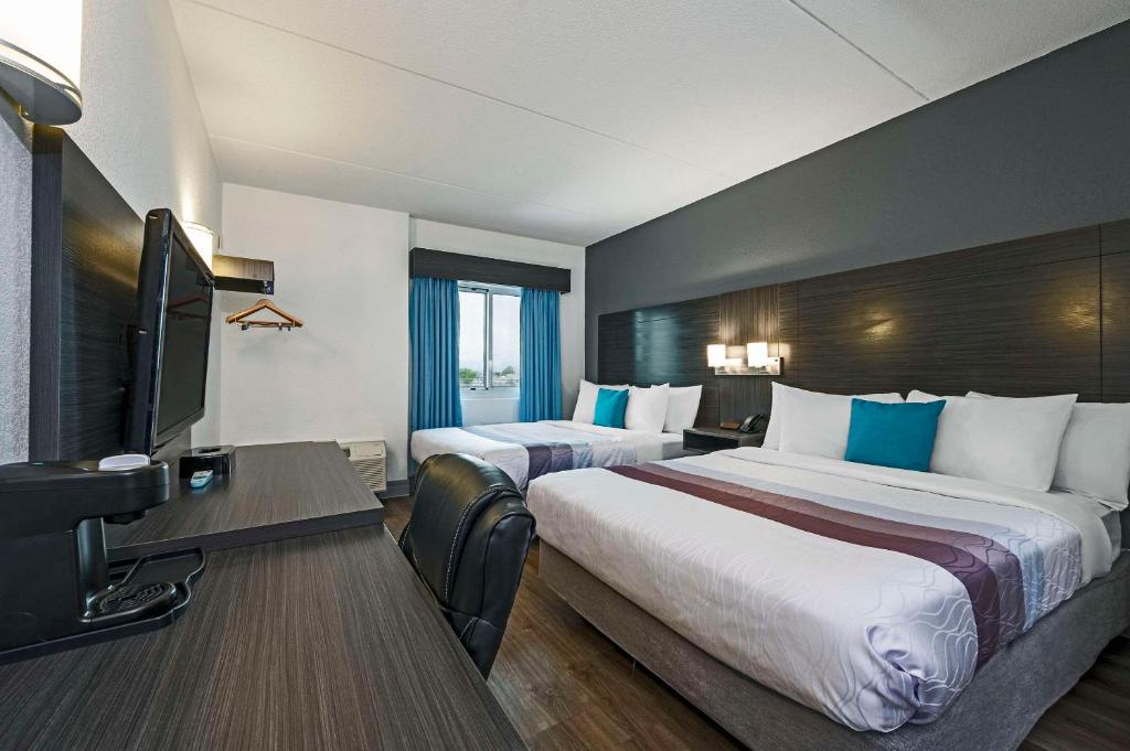 Postel nebo postele na pokoji v ubytování Comfort Hotel