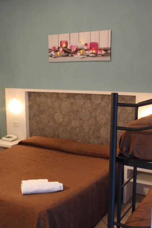 Postel nebo postele na pokoji v ubytování Hotel Senyor