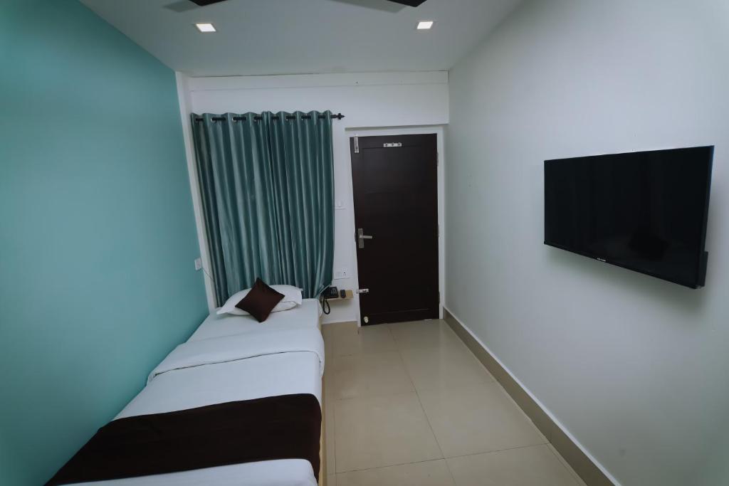 Letto o letti in una camera di Hotel Eastern