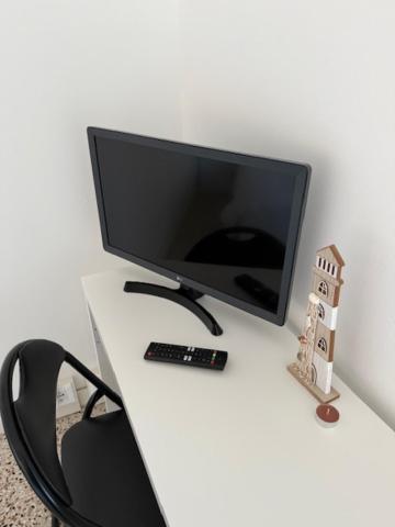 TV a/nebo společenská místnost v ubytování Villa Cecilia