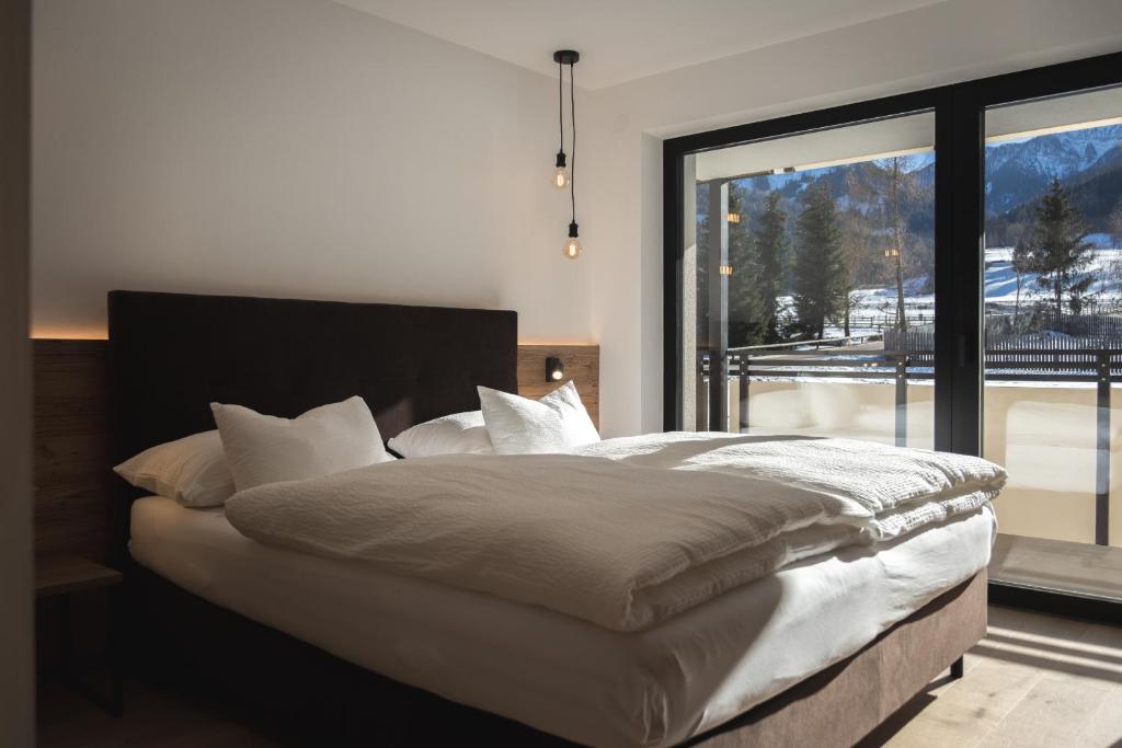 Кровать или кровати в номере Sottla - your mountain home