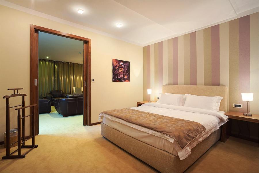 Cama o camas de una habitación en Hotel Turist
