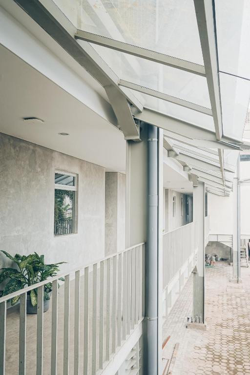 an external view of a building with a balcony at Koja CoLiving in Bandung