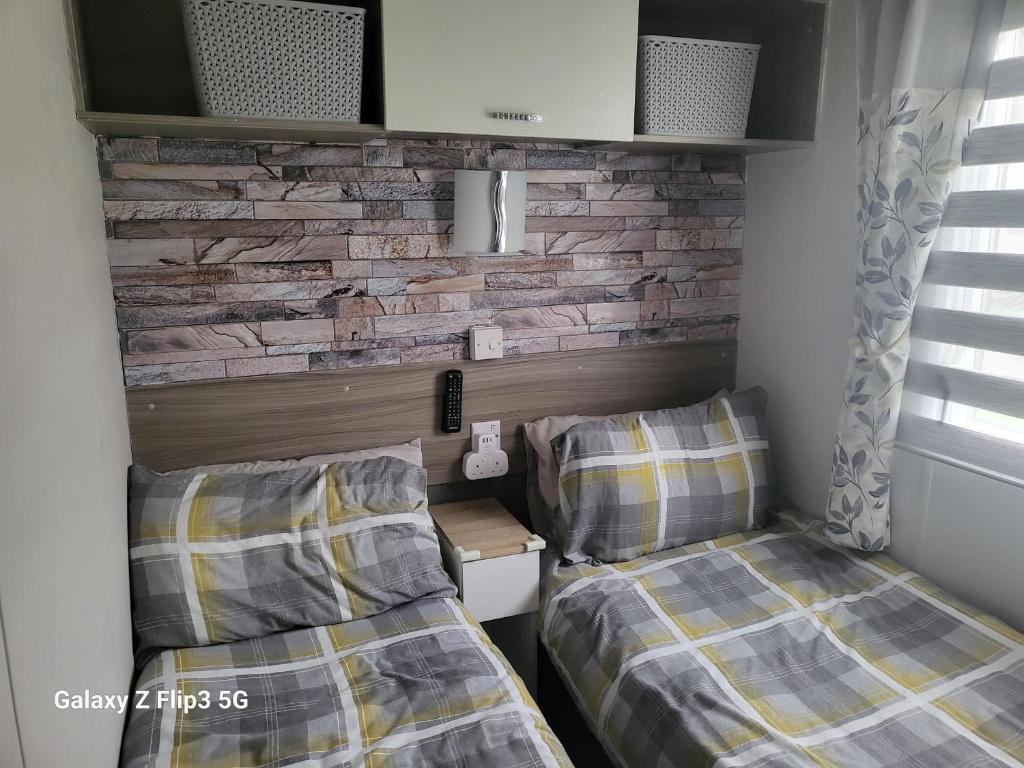 Postel nebo postele na pokoji v ubytování MLR at Craig Tara Bay View
